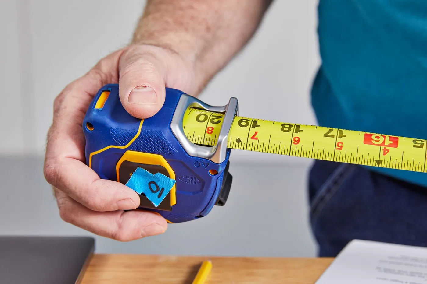 Engineer measuring up for a boiler sizing survey